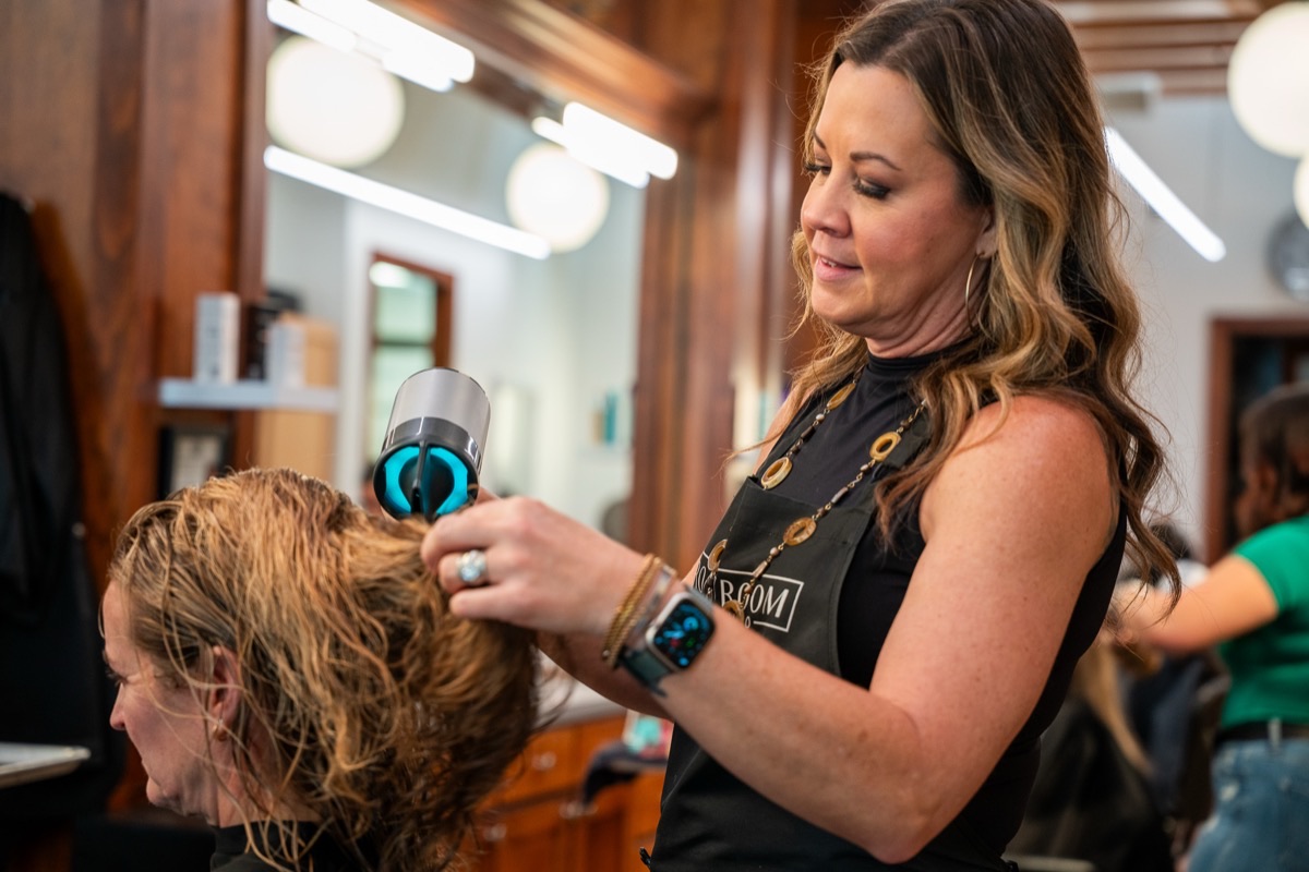 Blowout and styling finish at Front Room Hair Studio in Houston